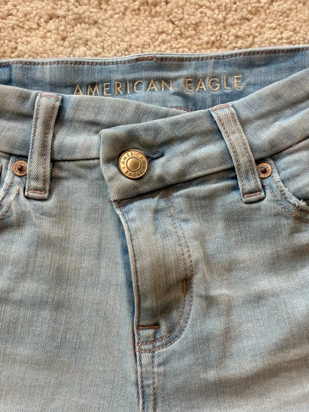 American Eagle Curvy High-Rise Shortie Stretch Jean Cross-Front Button Shorts - Picture 3 of 14